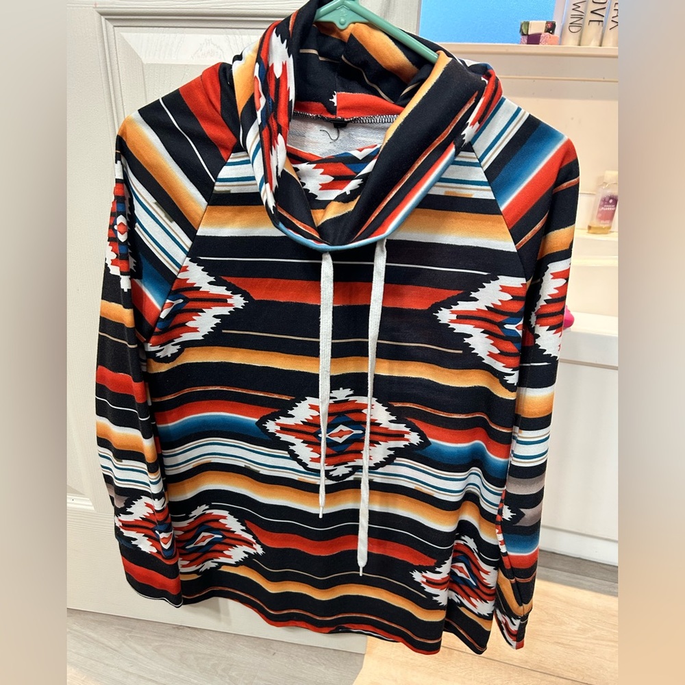 Ladies Aztec print. Size large. Unsure brand.